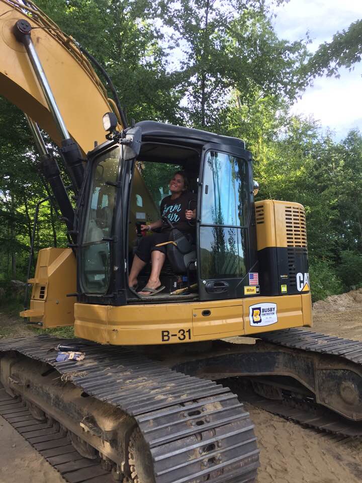 Alicia construction Working hard improving the farm land.